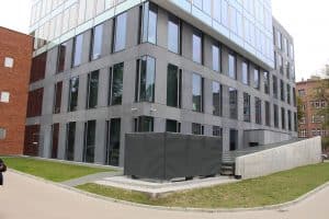 A concrete building with windows.